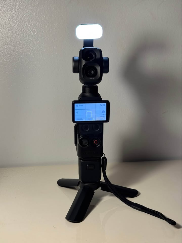 DJI Osmo Pocket 4P with Free Accessories - Pre-Owned gallery thumbnail