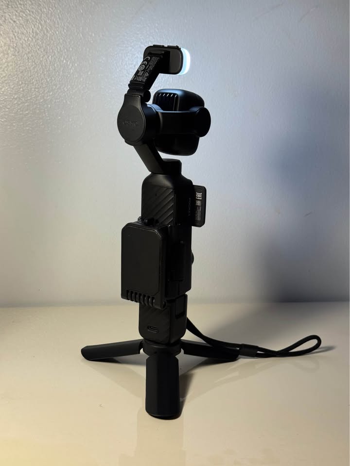 DJI Osmo Pocket 4P with Free Accessories - Pre-Owned gallery thumbnail